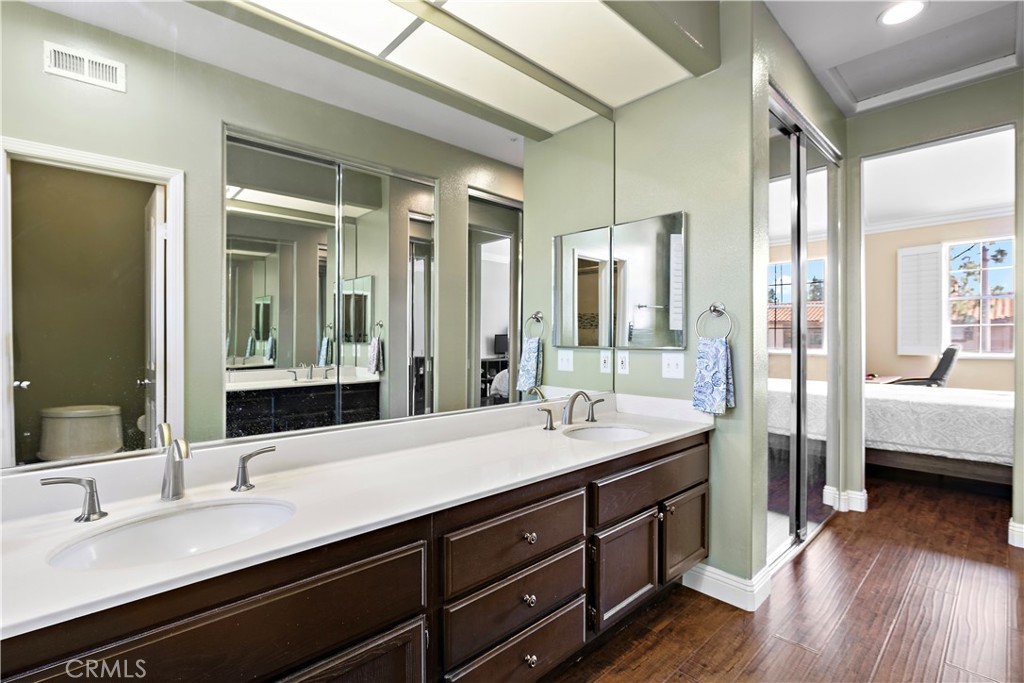 Primary Bathroom with two​​‌​​​​‌​​‌‌​​‌‌​​‌‌​​‌​​​‌‌​‌​​​​‌‌​‌​​ sinks - 13462 Savanna, Tustin CA 92782 - photo 20
