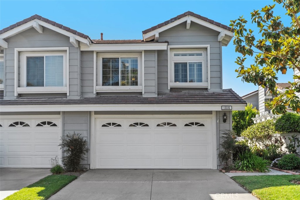 One of few locations with a driveway - 13595 Banyon, Tustin CA 92782 - photo 1