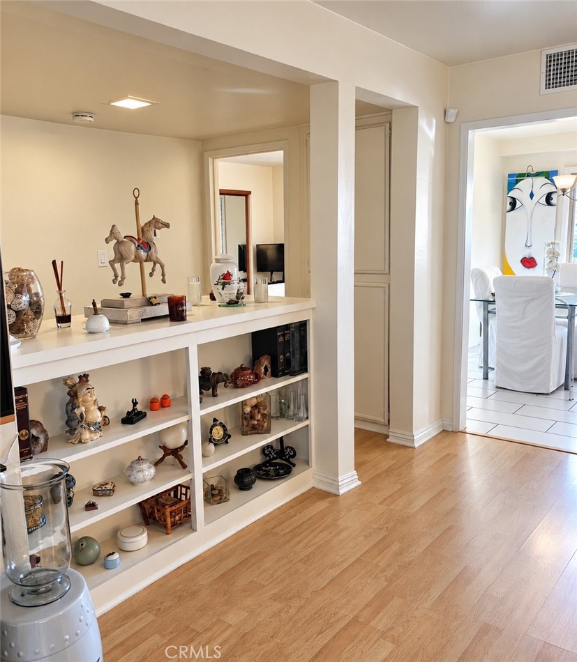 Living Room side of hall linen - 13722 Red Hill Avenue 35, Tustin CA 92780 - photo 2