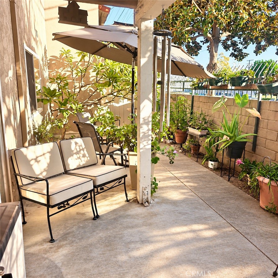 Back Patio - 13722 Red Hill Avenue 35, Tustin CA 92780 - photo 8