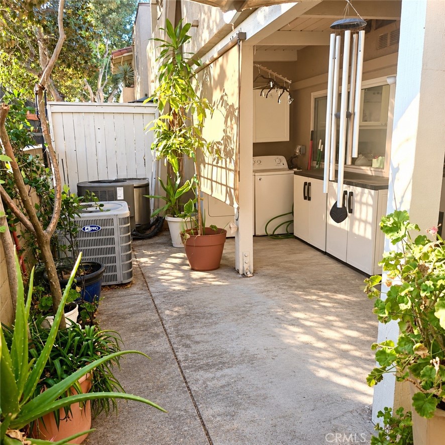 Back Patio/Laundry - 13722 Red Hill Avenue 35, Tustin CA 92780 - photo 9