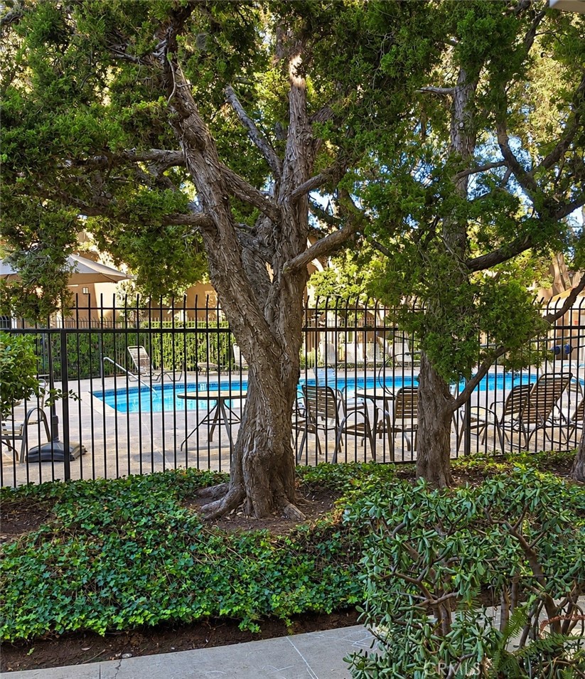 Pool View from Living Room - 13722 Red Hill Avenue 35, Tustin CA 92780 - photo 21