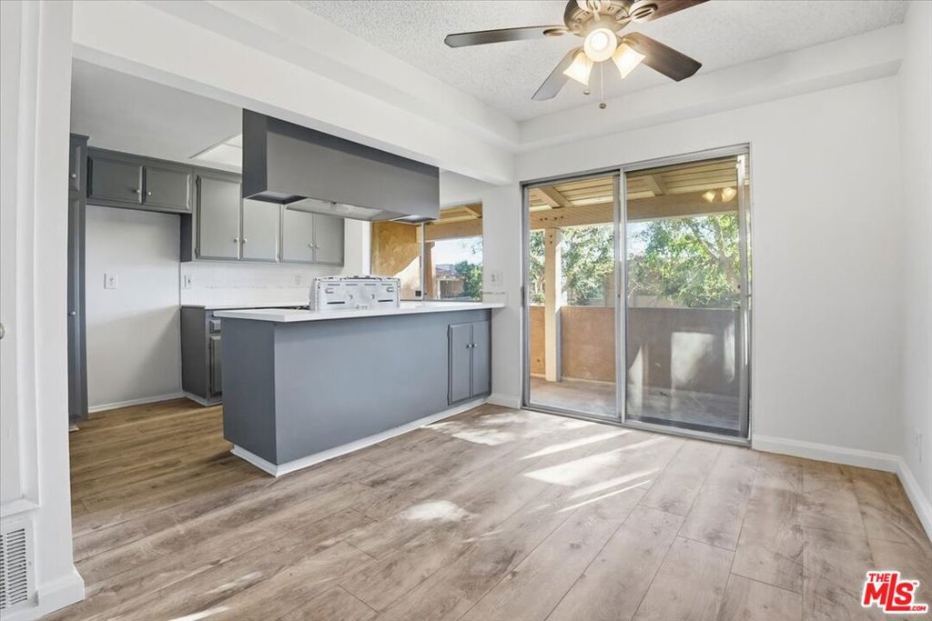 Dining and Kitchen - 13722 Red Hill Avenue 60, Tustin CA 92780 - photo 1