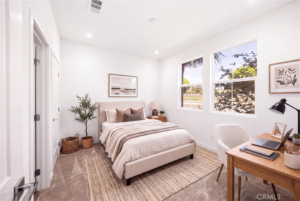 virtually staged-downstaist bedroom - 139 Jessup Way, Tustin CA 92780 - photo 5
