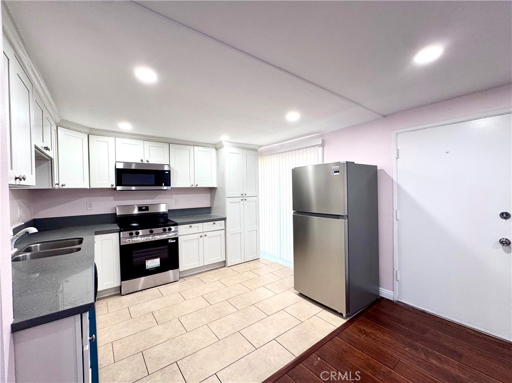 Kitchen by the Front Door with Brand New Appliances - 14292 Red Hill Avenue, Tustin CA 92780 - photo 5