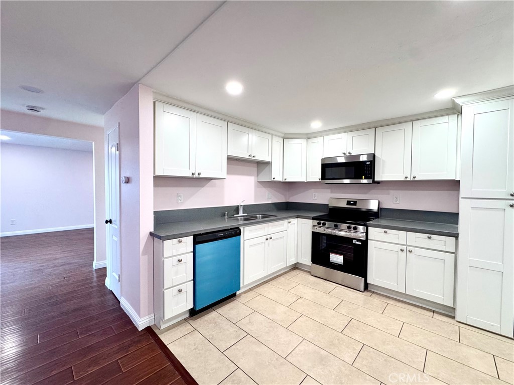 Another view of Kitchen from Front Door - 14292 Red Hill Avenue, Tustin CA 92780 - photo 6