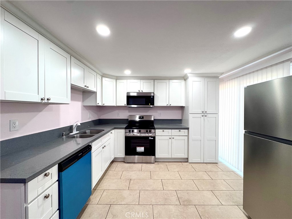 View of Kitchen from Dining Area - 14292 Red Hill Avenue, Tustin CA 92780 - photo 7