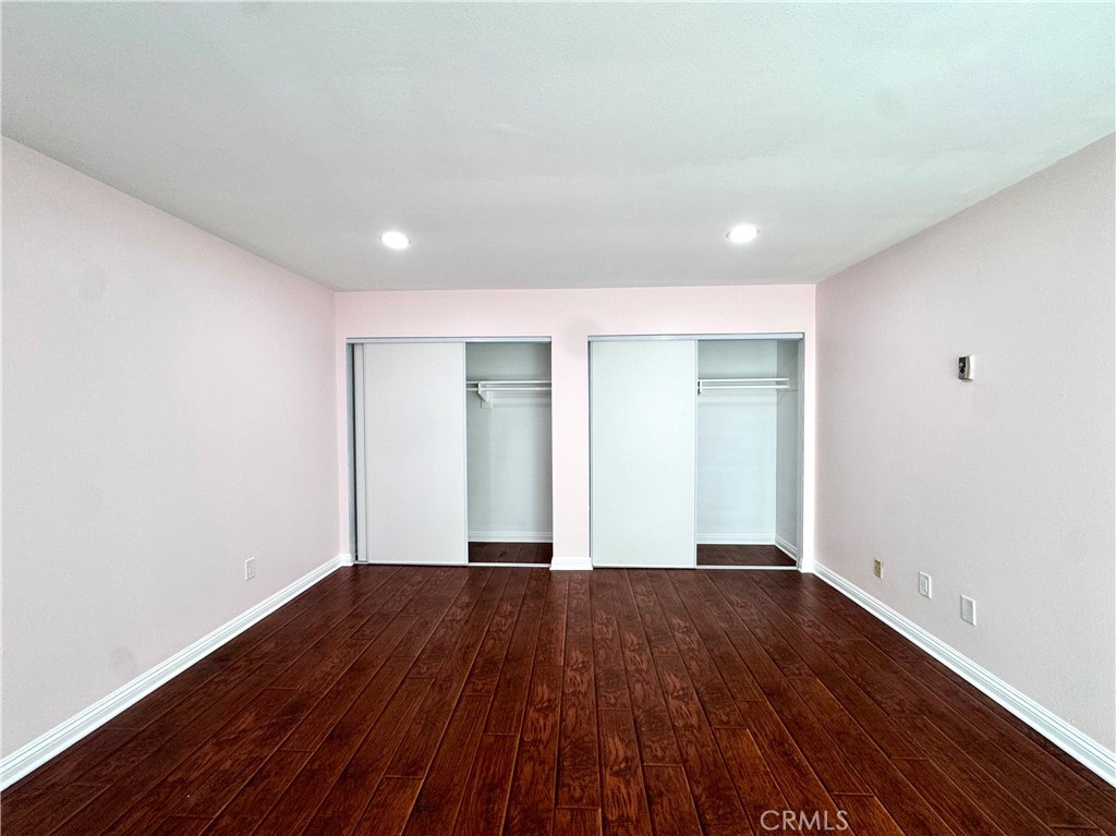 Upstairs main bedroom with dual closets - 14292 Red Hill Avenue, Tustin CA 92780 - photo 12