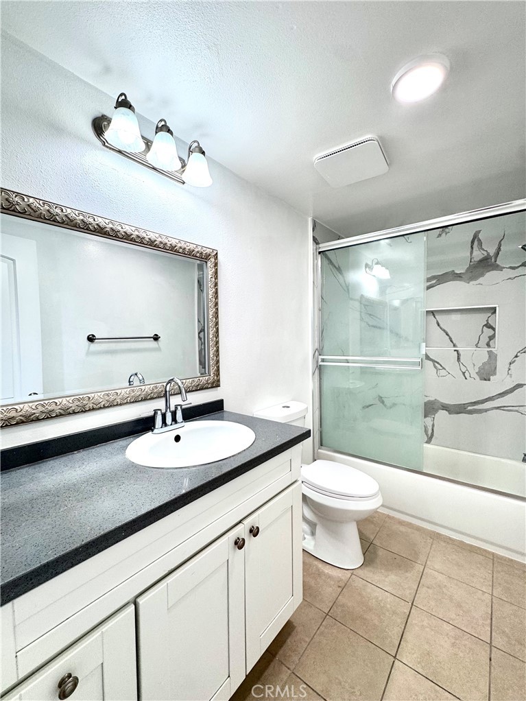 Second Bathroom in upstairs hallway with renovations - 14292 Red Hill Avenue, Tustin CA 92780 - photo 17