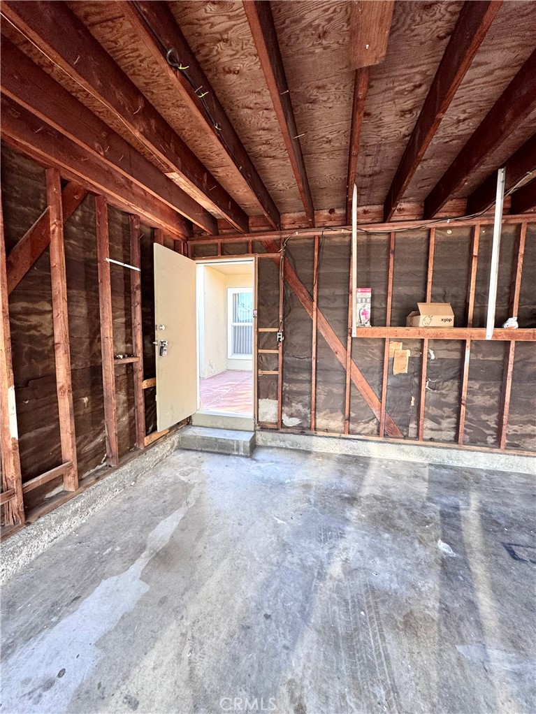 2 car garage with entrance to back patio area - 14292 Red Hill Avenue, Tustin CA 92780 - photo 25