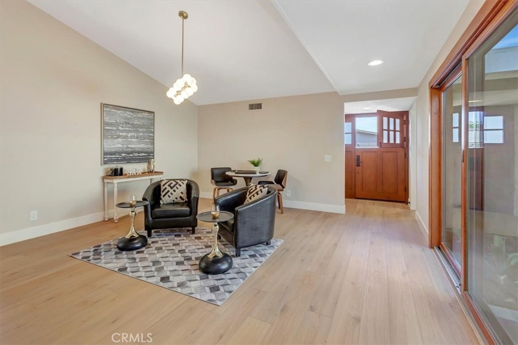 STAGING NOT INCLUDED - Family room - ALL NEW THROUGHOUT: paint, baseboards, flooring, lighting - vaulted ceiling family - 14412 GRASSMERE, Tustin CA 92780 - photo 2