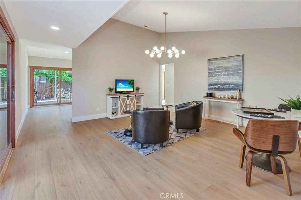 Another family room view towards back yard, kitchen on right - 14412 GRASSMERE, Tustin CA 92780 - photo 3