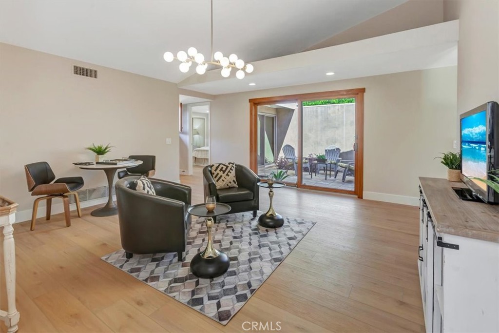 Atrium opens to family room - light and bright - 14412 GRASSMERE, Tustin CA 92780 - photo 4
