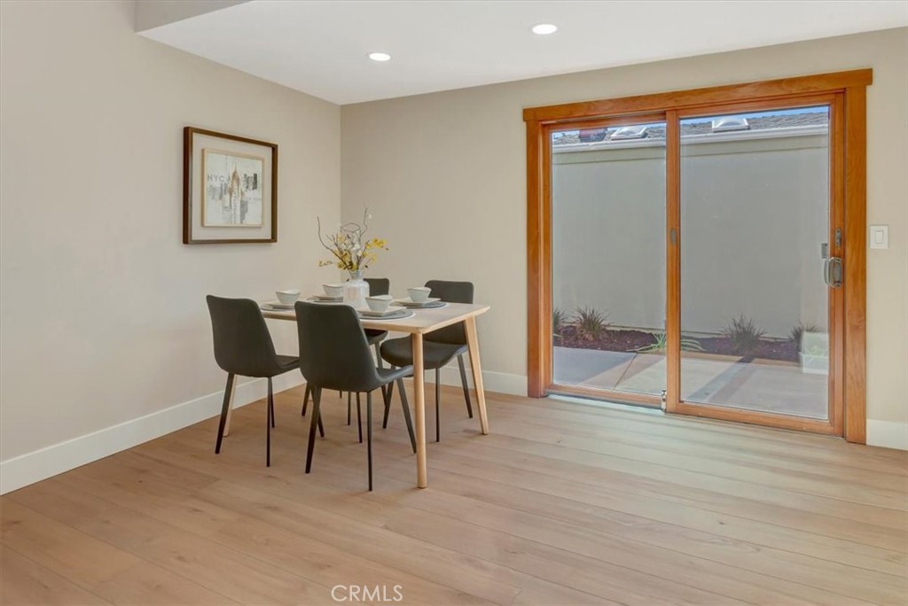 Large dining room for expanding tables and more guests! Open to lush side yard and lots of natural light, recessed light - 14412 GRASSMERE, Tustin CA 92780 - photo 10