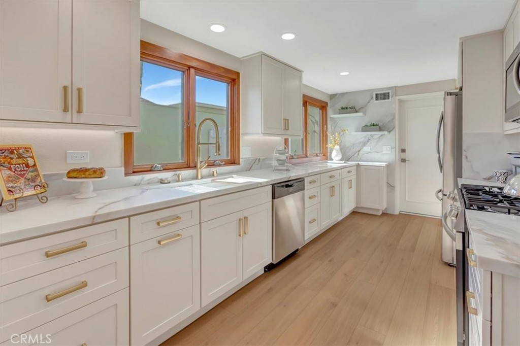 LONG Counter tops for any and all cooking, baking, frosting cookies and also great for hosting buffets! - 14412 GRASSMERE, Tustin CA 92780 - photo 11