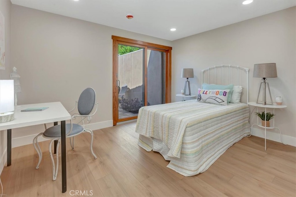 Second bedroom (of three) open to atrium/outdoor light - 14412 GRASSMERE, Tustin CA 92780 - photo 19
