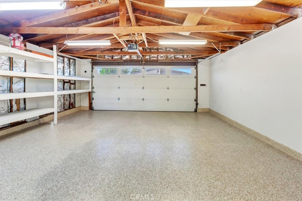 Epoxied garage flooring, freshly painted, laundry area - 14412 GRASSMERE, Tustin CA 92780 - photo 22