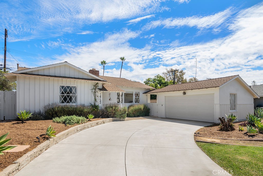 Front Elevation and approach to the two car garage - 14752 Romanza, Tustin CA 92780 - photo 2