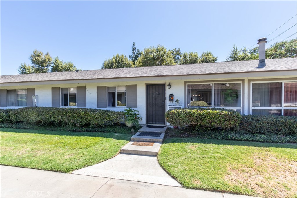 Single level condo updated top to bottom! Beautiful gated community with pool and more! - 14802 Newport Avenue 18C, Tustin CA 92680 - photo 1