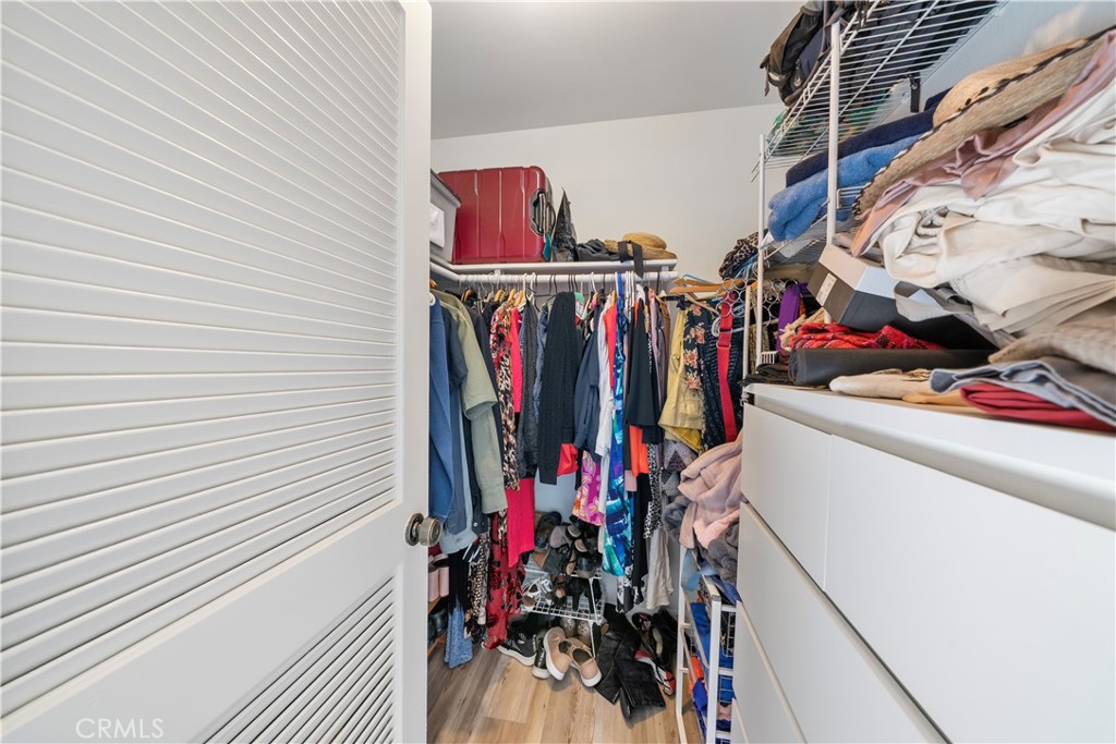 Downstairs Primary Closet - 15732 S B A, Tustin CA 92780 - photo 11