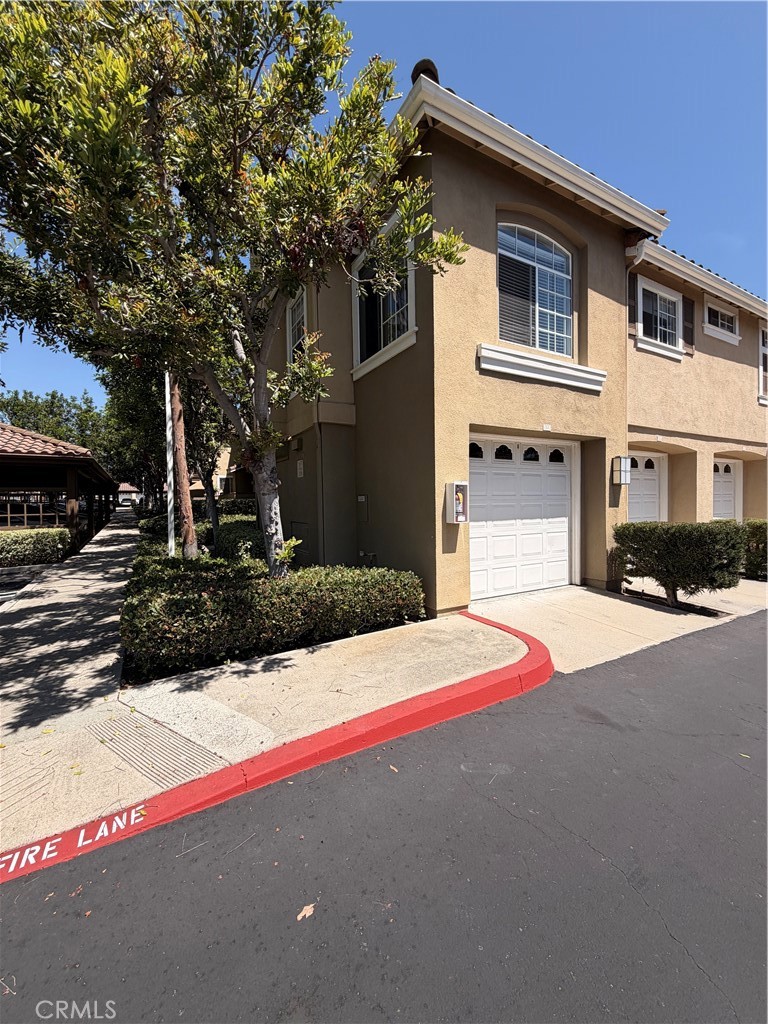 great end unit with garage - 168 Gallery, Tustin CA 92782 - photo 1