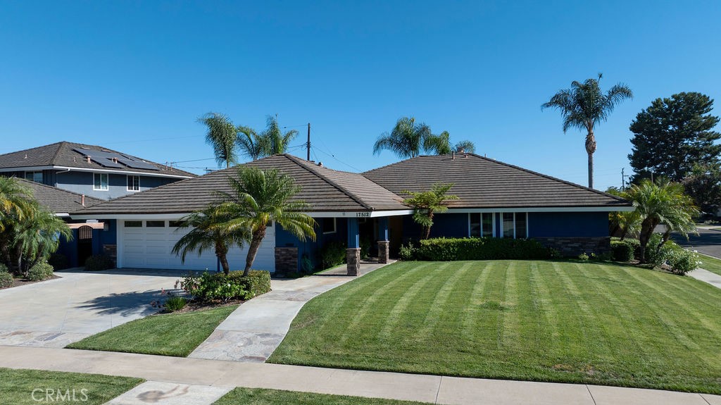 Welcome to 17512 Orange Tree Lane, a beautiful corner lot in a great Tustin location. - 17512 Orange Tree Lane, Tustin CA 92780 - photo 1