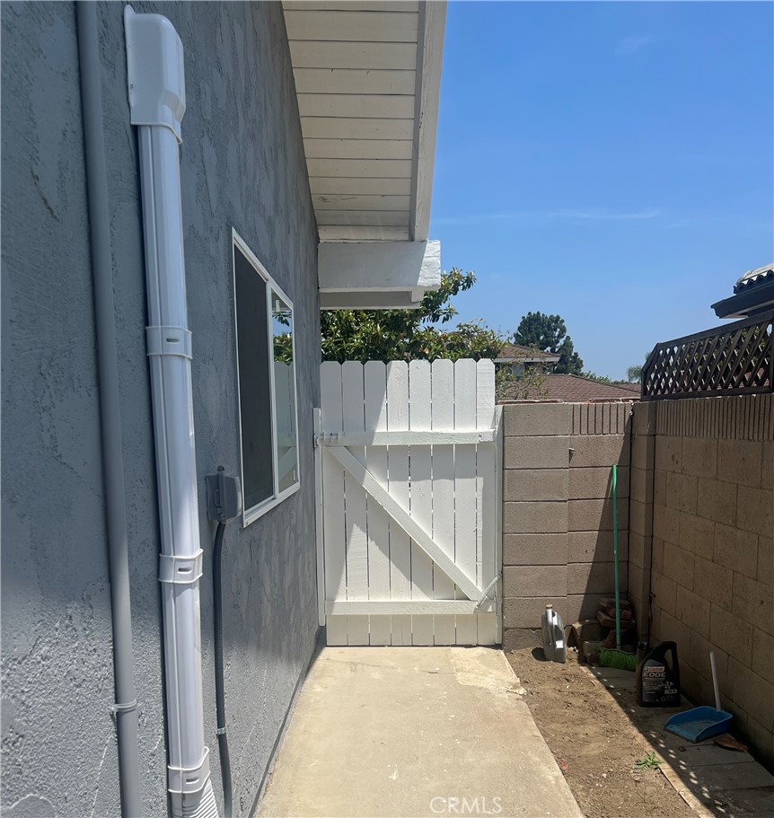 Exiting the side gate - 17536 Sherbrook 3, Tustin CA 92780 - photo 5