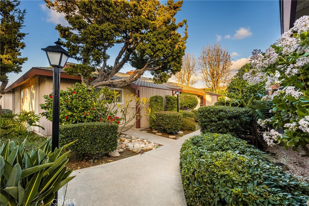 approach to entry, easy location access to greenbelts and garage - 17952 Irvine Blvd, Tustin CA 92780 - photo 18