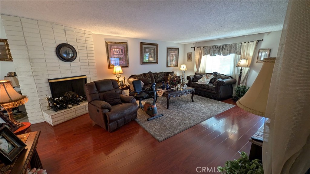 Chimney in the living room - 17956 Irvine Boulevard, Tustin CA 92780 - photo 3