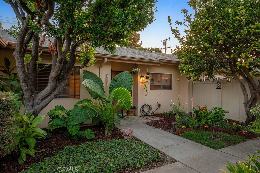 Beautifully landscaped front entry - 1881 Mitchell Avenue 135, Tustin CA 92780 - photo 2