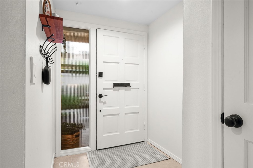 Bright, welcoming entry - 1881 Mitchell Avenue 135, Tustin CA 92780 - photo 6