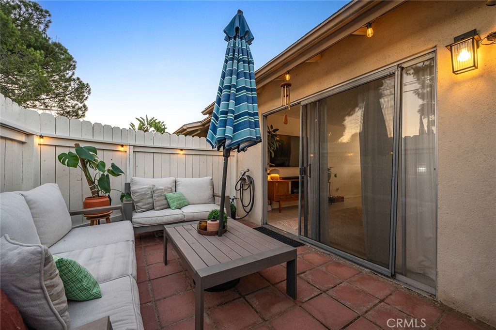 Private patio just off the living area, creating a great indoor-outdoor space - 1881 Mitchell Avenue 135, Tustin CA 92780 - photo 33