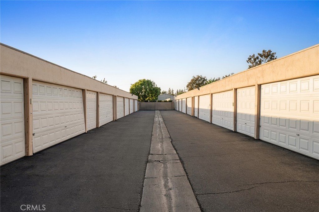 Detached garage located just behind the home for easy parking and additional storage - 1881 Mitchell Avenue 135, Tustin CA 92780 - photo 35