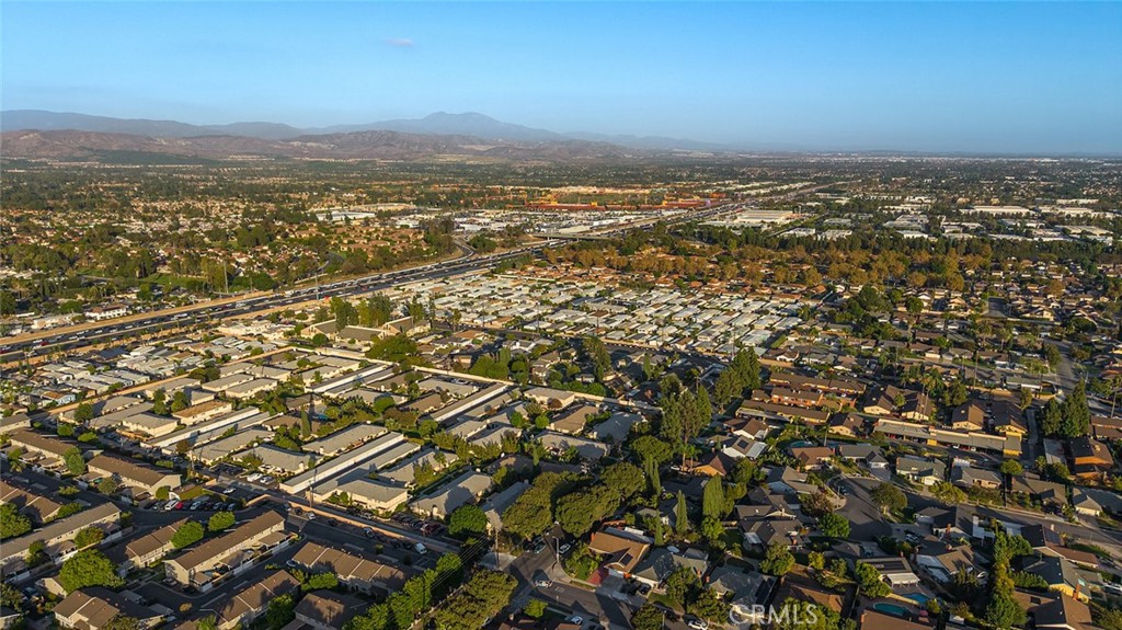 Aerial view showing easy access to both the 5 and 55 freeways, making it convenient to get around Orange County - 1881 Mitchell Avenue 135, Tustin CA 92780 - photo 41