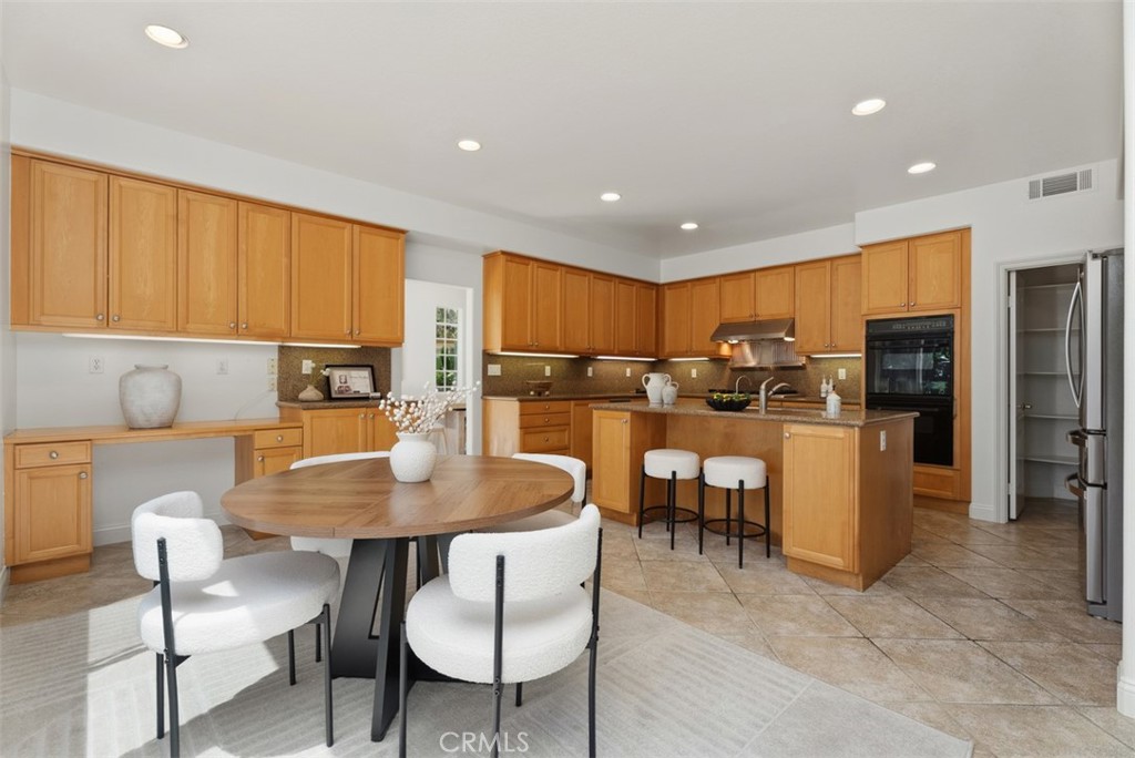Chef inspired kitchen with large isle - 2150 Chandler Drive, Tustin CA 92782 - photo 15