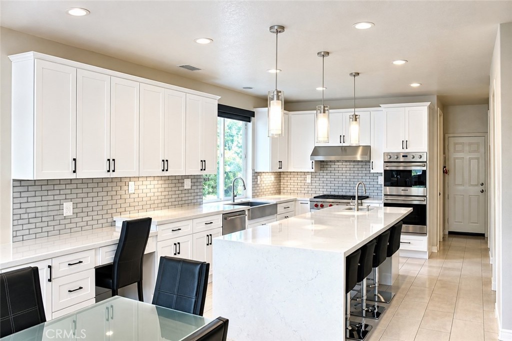 Remodeled Kitchen with Quartz Counters and Stainless Appliances - 2305 Pieper Lane, Tustin CA 92782 - photo 2