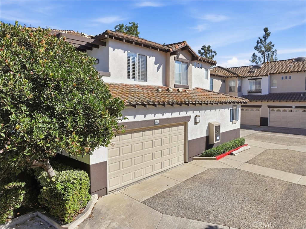 2 car attached garage - 2322 Ternberry Court, Tustin CA 92782 - photo 23