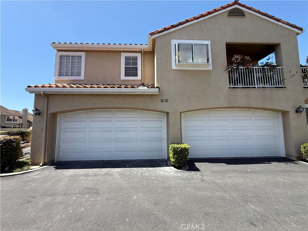 2-CAR ATTACHED GARAGE - 2481 Paseo Circulo, Tustin CA 92782 - photo 1