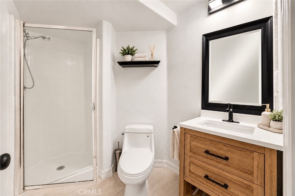 Downstairs Bathroom - Virtually Staged - 2588 Thorman, Tustin CA 92782 - photo 13