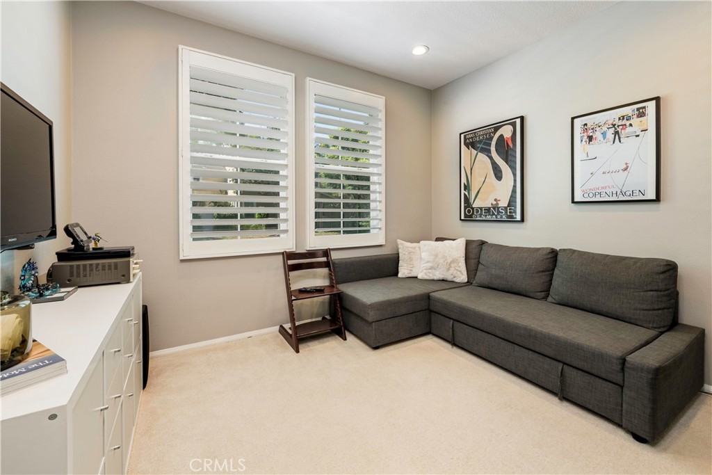 Downstairs bedroom or office. - 3216 Carrotwood, Tustin CA 92782 - photo 15