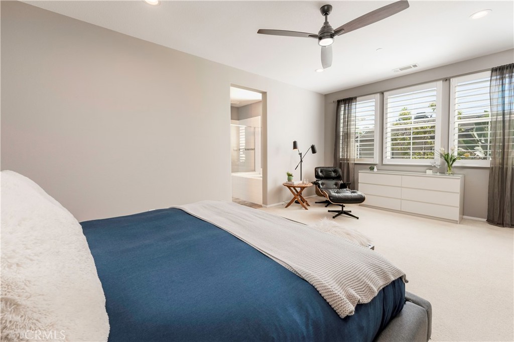 Spacious primary bedroom. - 3216 Carrotwood, Tustin CA 92782 - photo 25