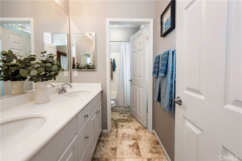 Upstairs guest bathroom. - 3216 Carrotwood, Tustin CA 92782 - photo 32