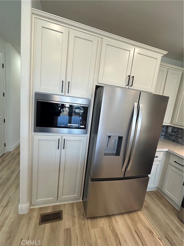 microwave and refrigerator - 40 Via Entrada, Tustin CA 92780 - photo 12