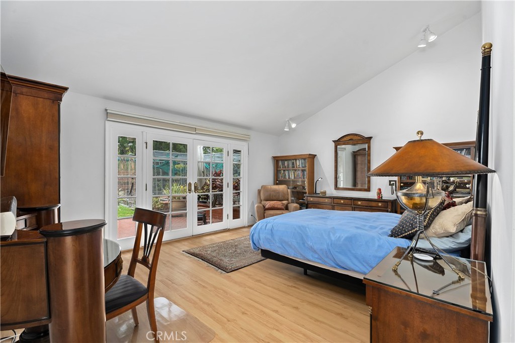 Primary bedroom overlooking the gardens with its own patio - 10371 Balliet Drive, Villa Park CA 92861 - photo 19
