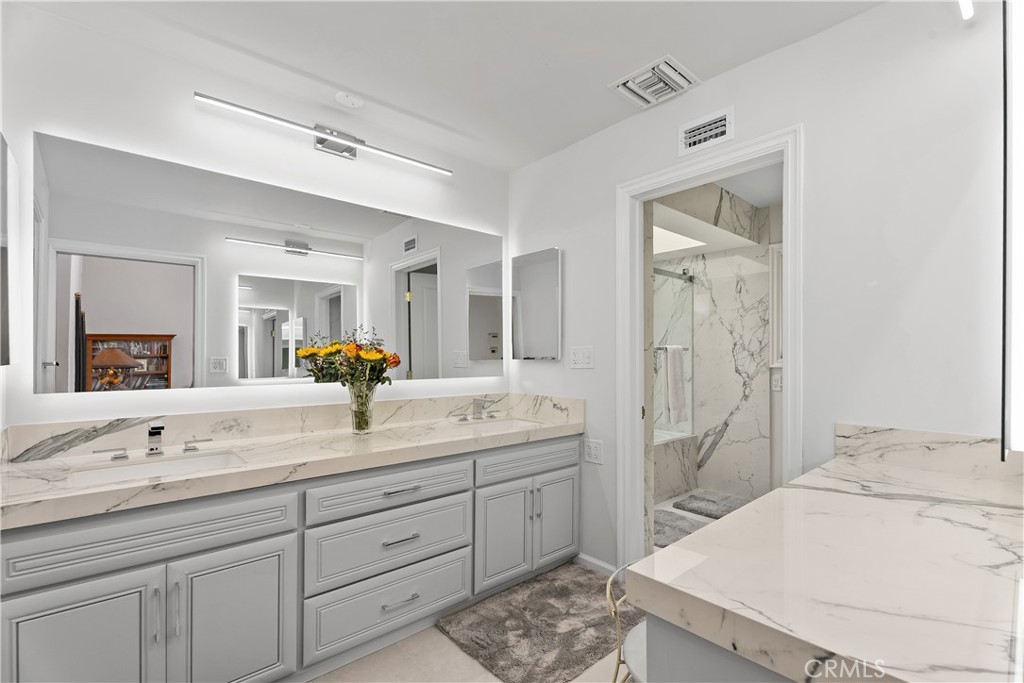 Newly remodeled Primary bath - 10371 Balliet Drive, Villa Park CA 92861 - photo 21
