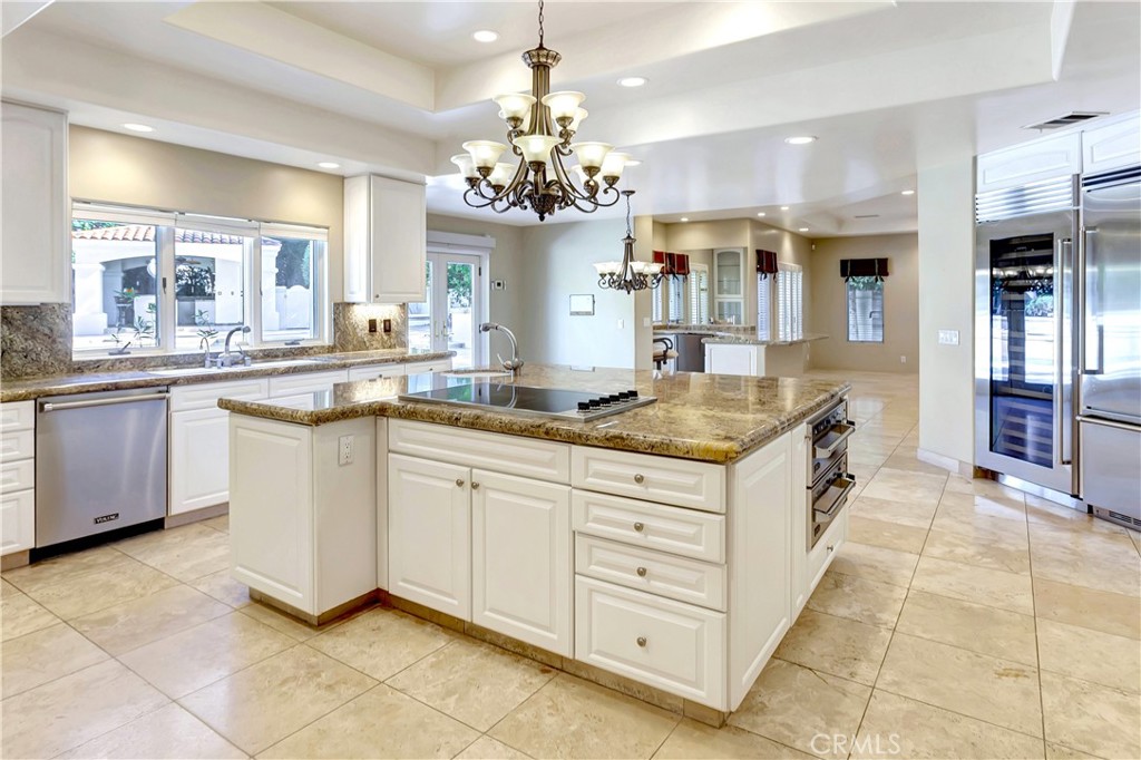 It's a Huge Kitchen with a very large island - 10762 Center Drive, Villa Park CA 92861 - photo 14