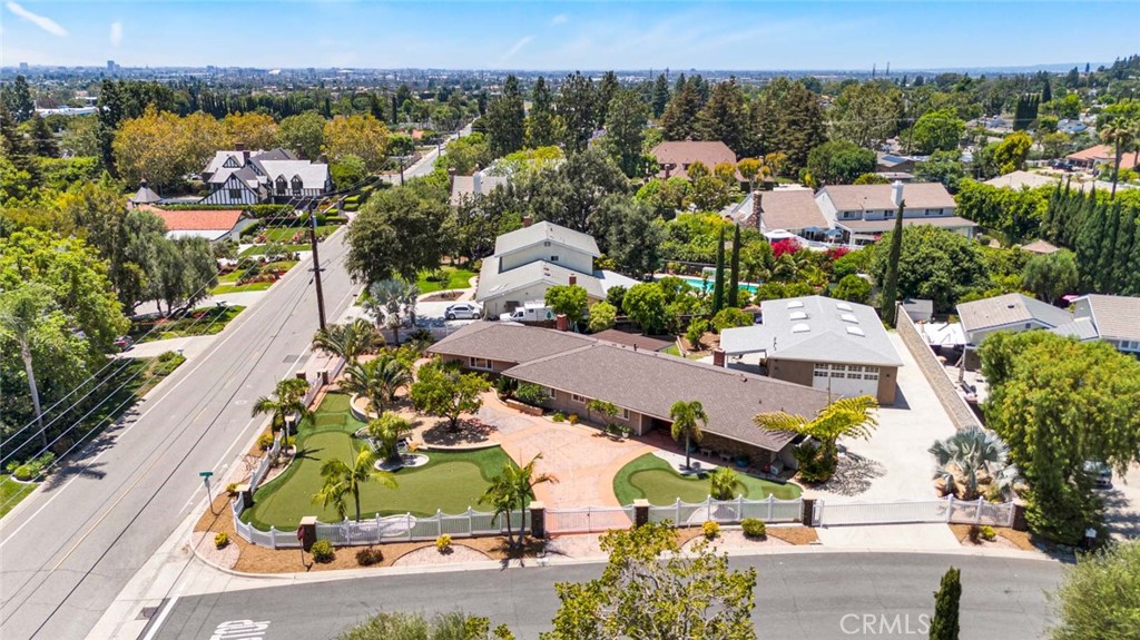 Overhead view shows prime location of corner property with double gated circular drive and separate gate for large 1500 - 18381 Serrano, Villa Park CA 92861 - photo 2
