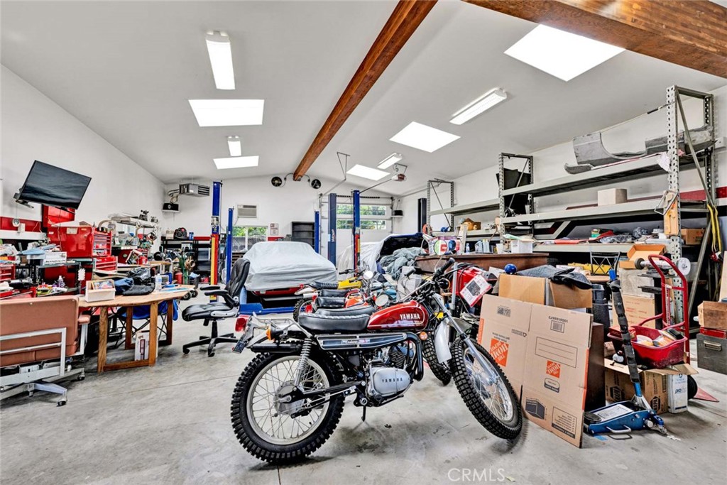 Separate garage showing back door for vehicles. - 18381 Serrano, Villa Park CA 92861 - photo 9