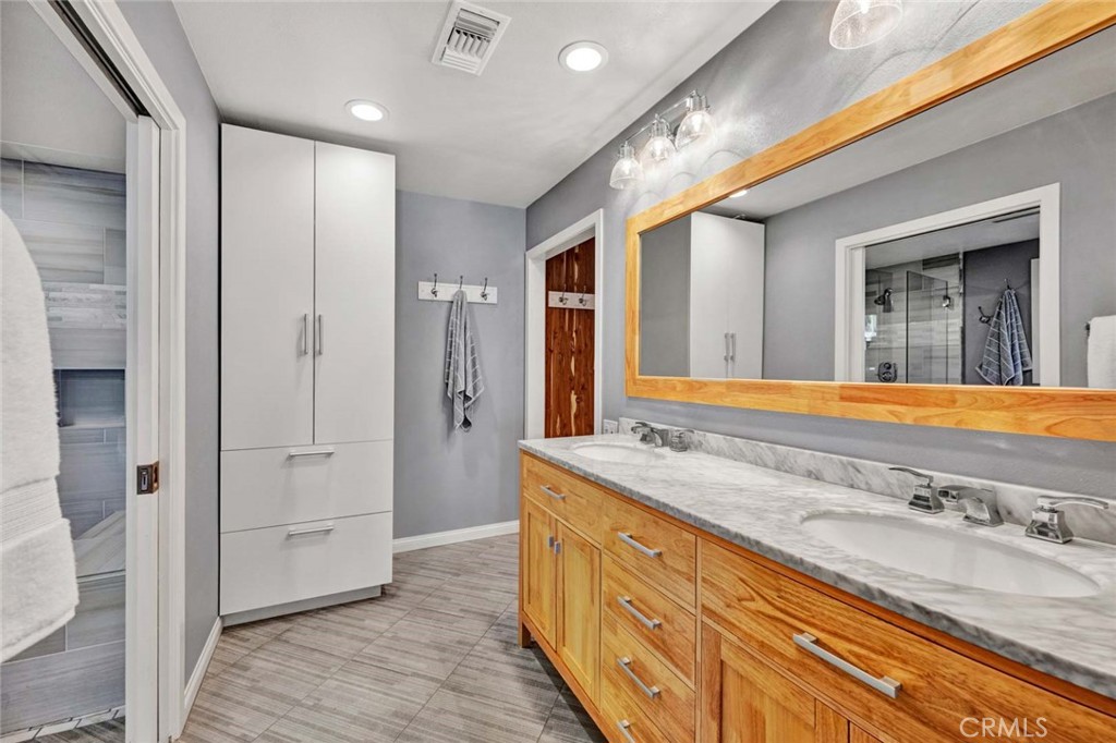 Primary bath with two sinks. - 18381 Serrano, Villa Park CA 92861 - photo 19
