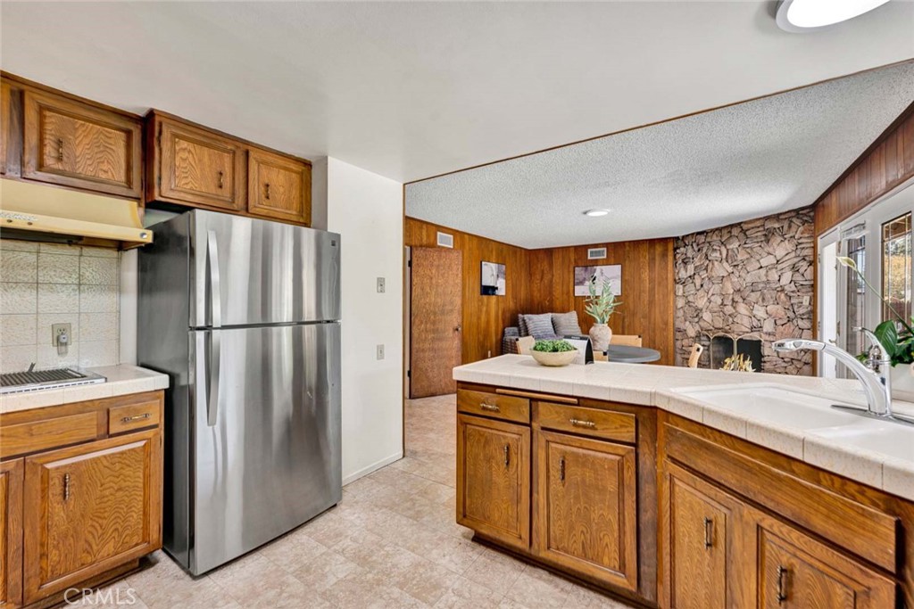 Kitchen looking towards Family room. - 18381 Serrano, Villa Park CA 92861 - photo 25